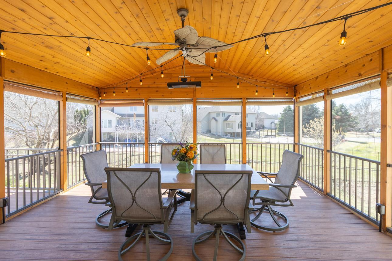 Large screen porch complete with built-in speakers and a heater for cooler days