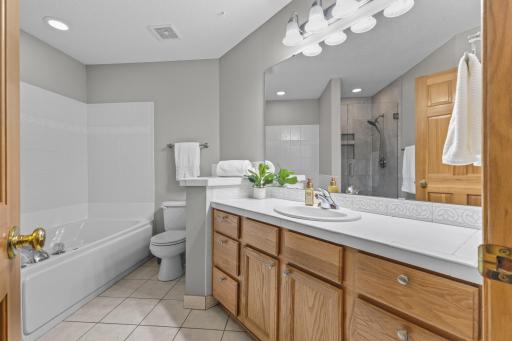 The updates continue in the primary bathroom with ceramic floors, generous vanity, updated light fixtures and neutral walls.