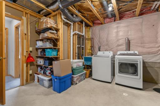Abundance of storage in the laundry space.