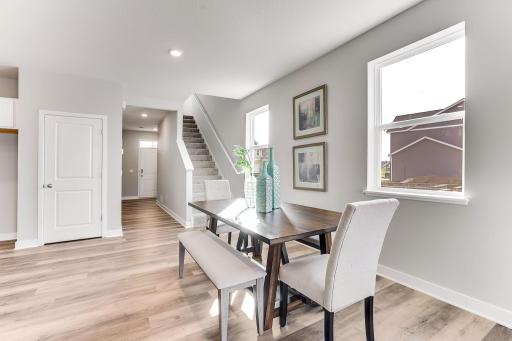 *Photos are of a previous staged model* Another angle of the designated dining area