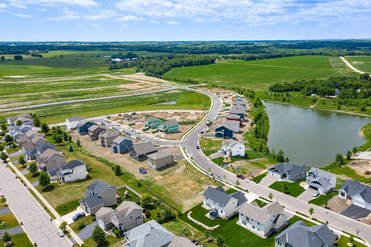 Aerial view of homes and pond at Bridle Creek in Jordan