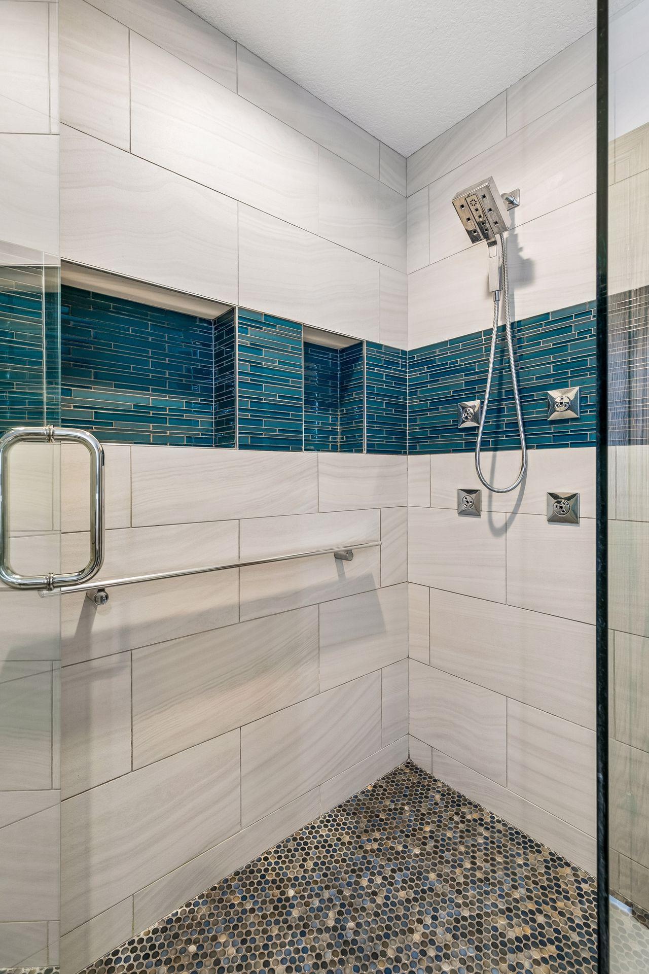 This bath has side body spray heads and heated floors!