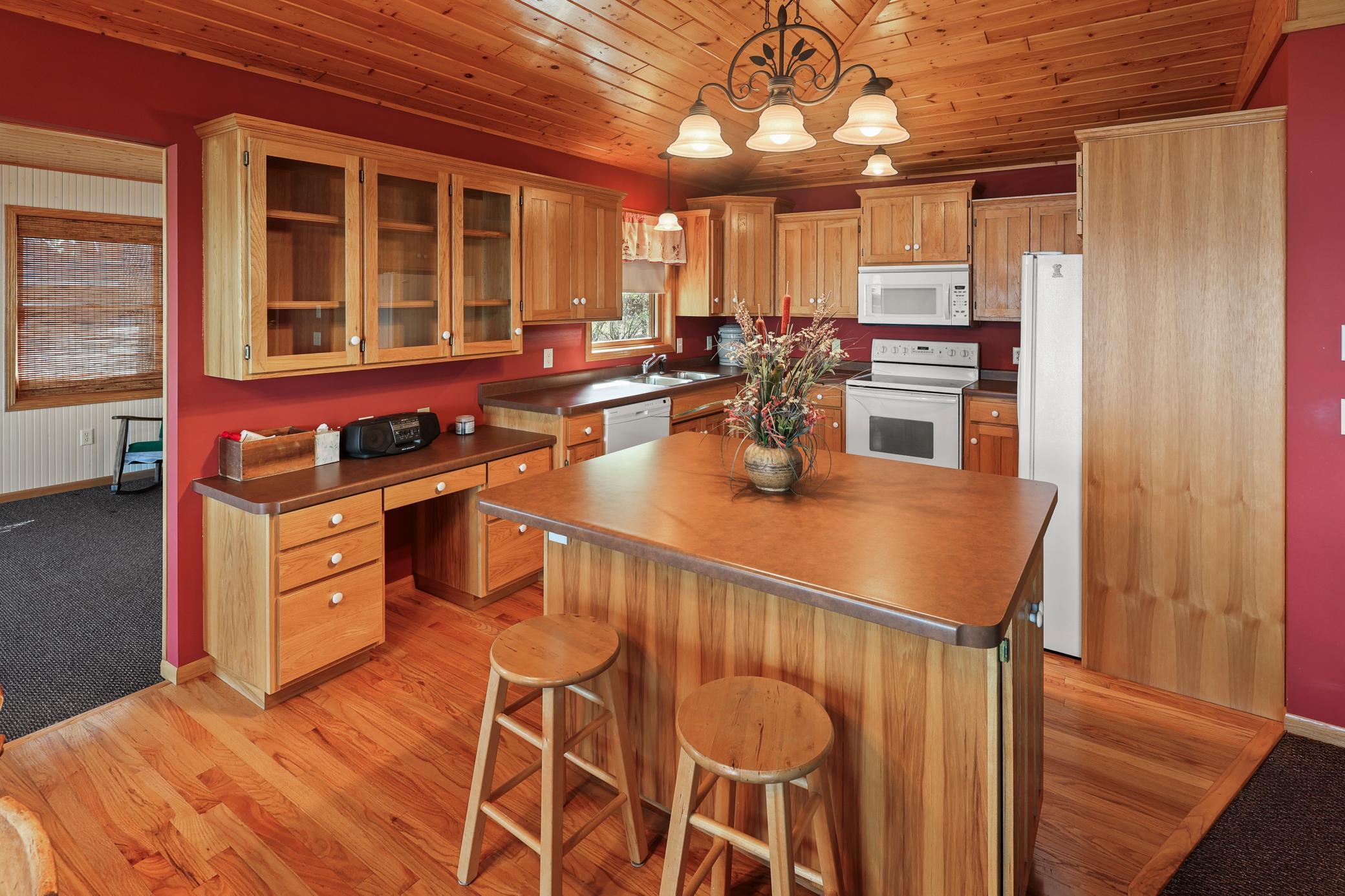 Center island with snack bar and more storage.