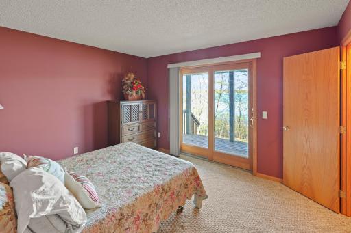 Primary bedroom walks out to covered porch