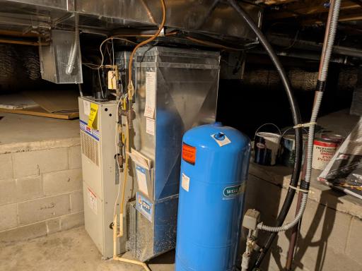 Approximately 6 foot tall room in part of crawl space houses utilities