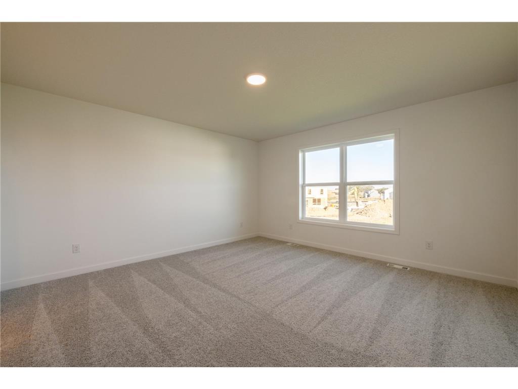 Primary Bedroom with walk-in closet