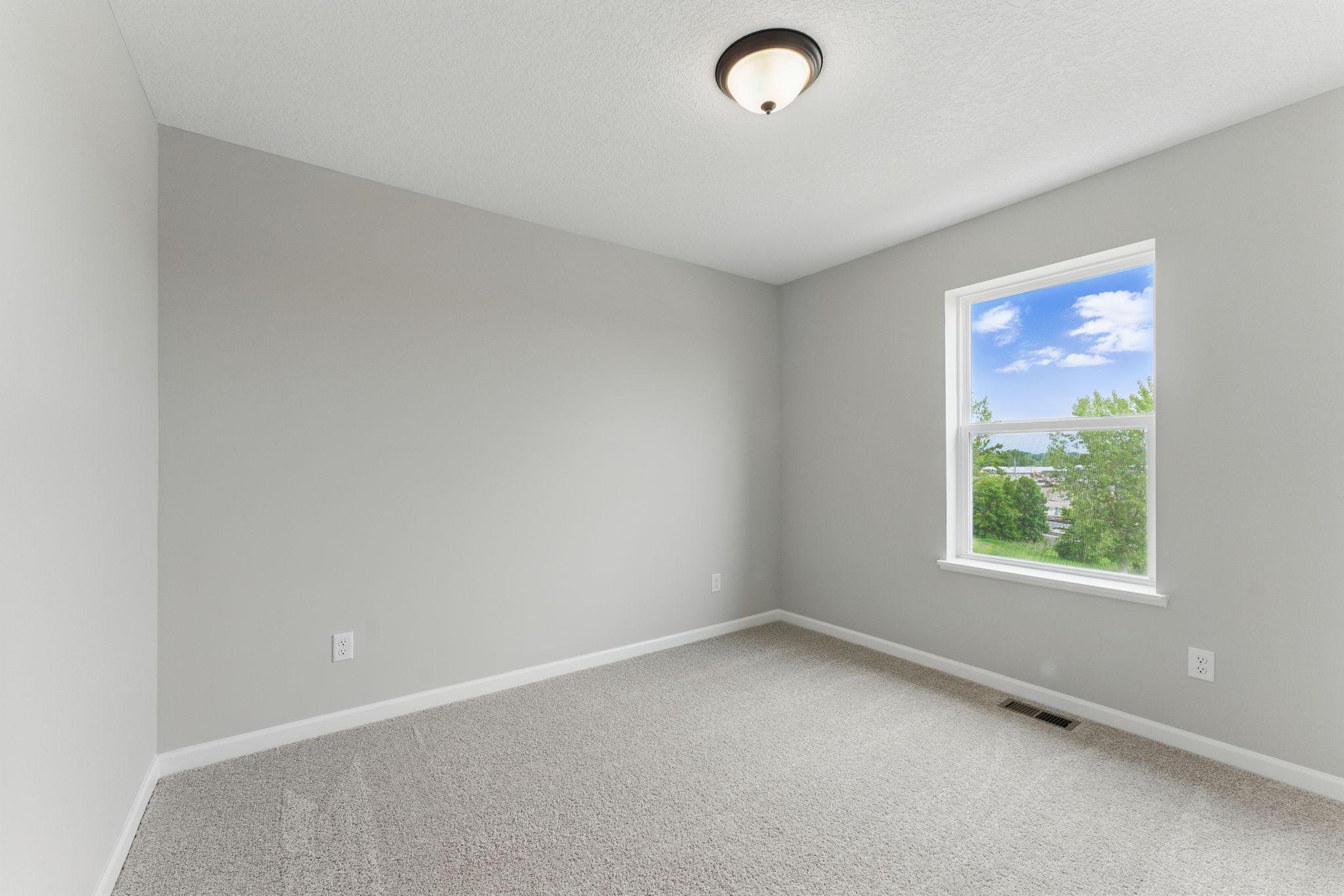 Bedroom #3 provides ample space for another member of the family or guest.