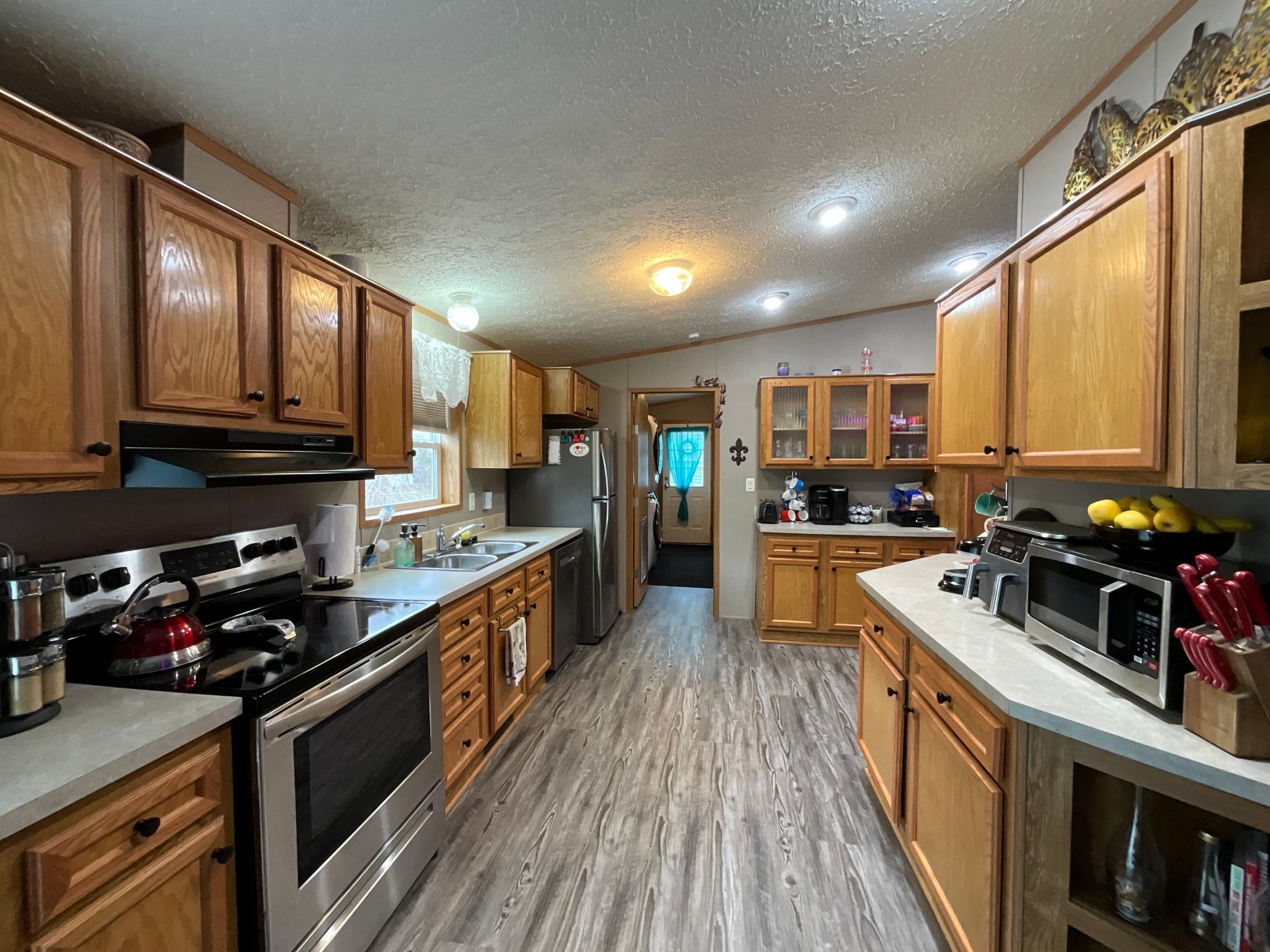 Spacious Kitchen with Cupboards Galore.jpg