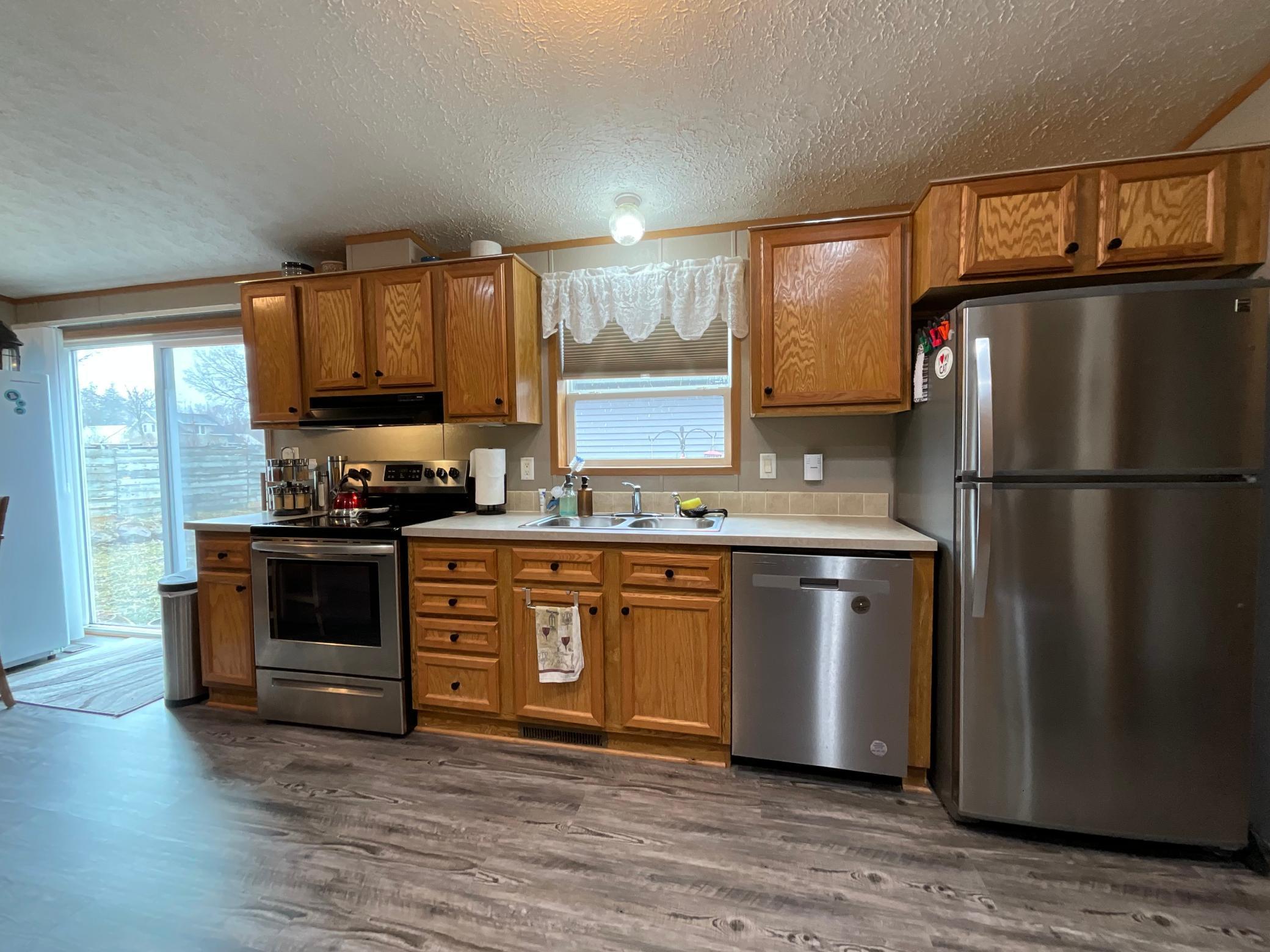 Kitchen window looking out to the back yard.jpg
