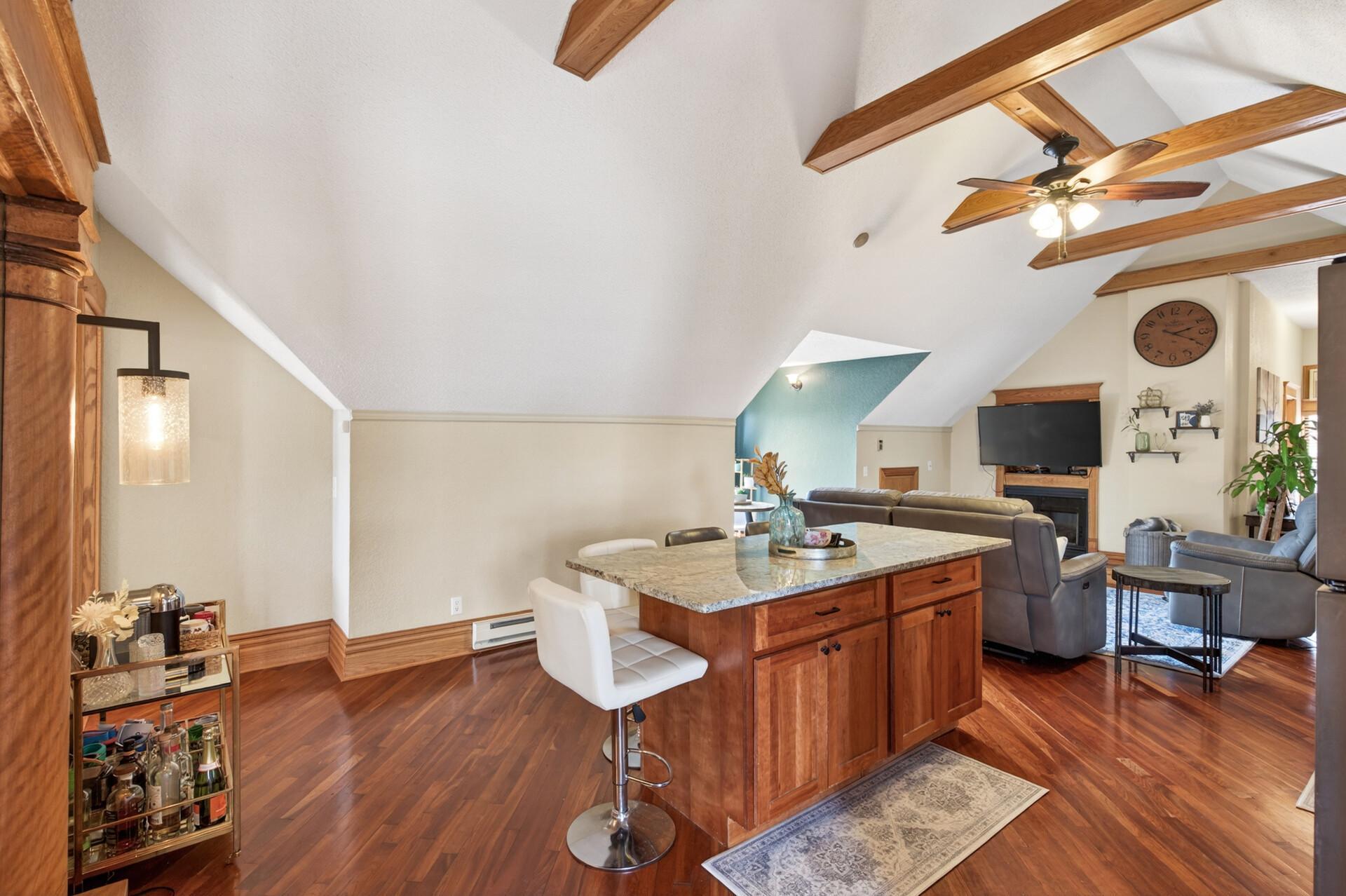 The center island provides additional storage/prep space with seating.