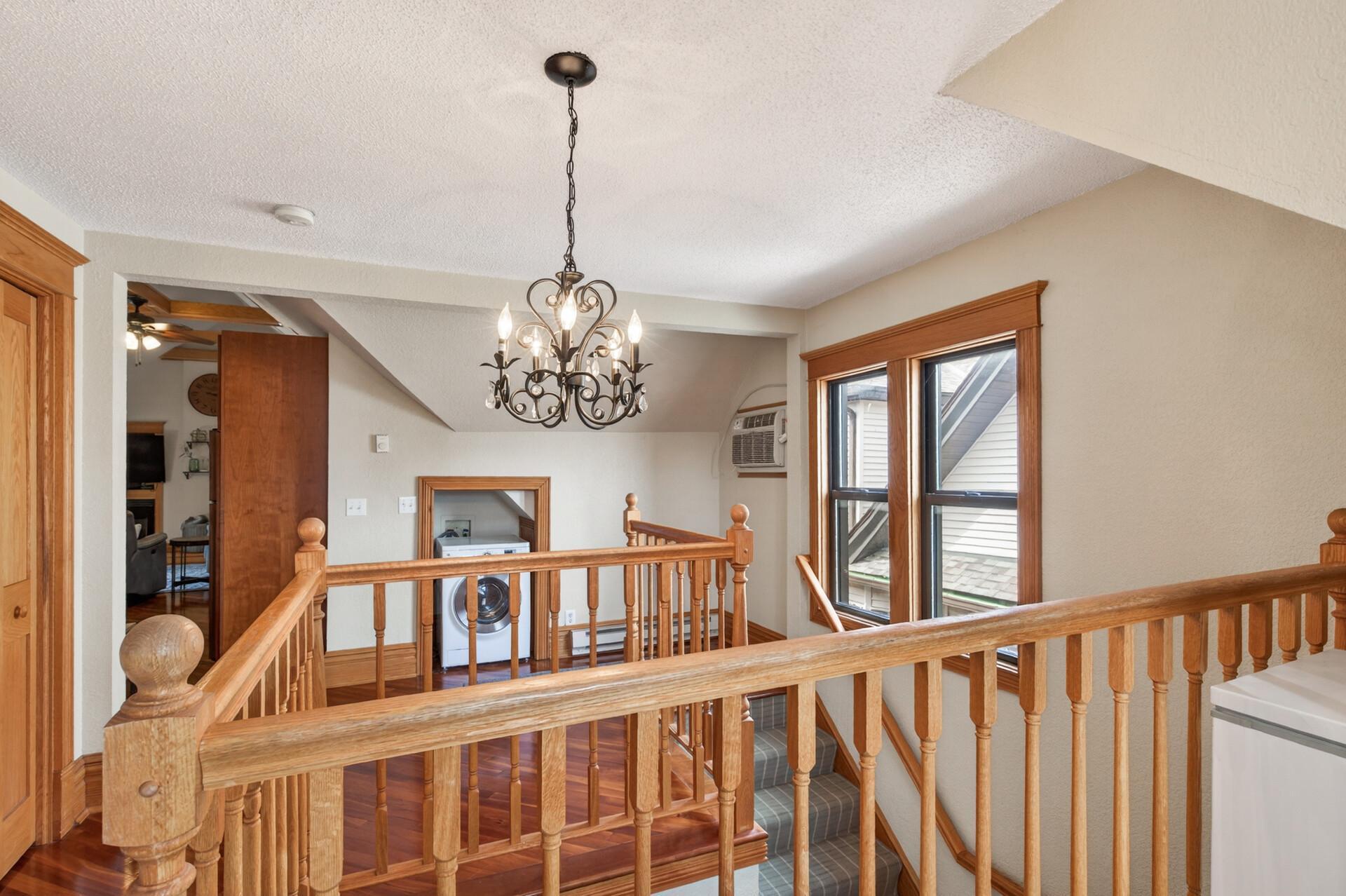 Formal entryway with in-unit washer/dryer.