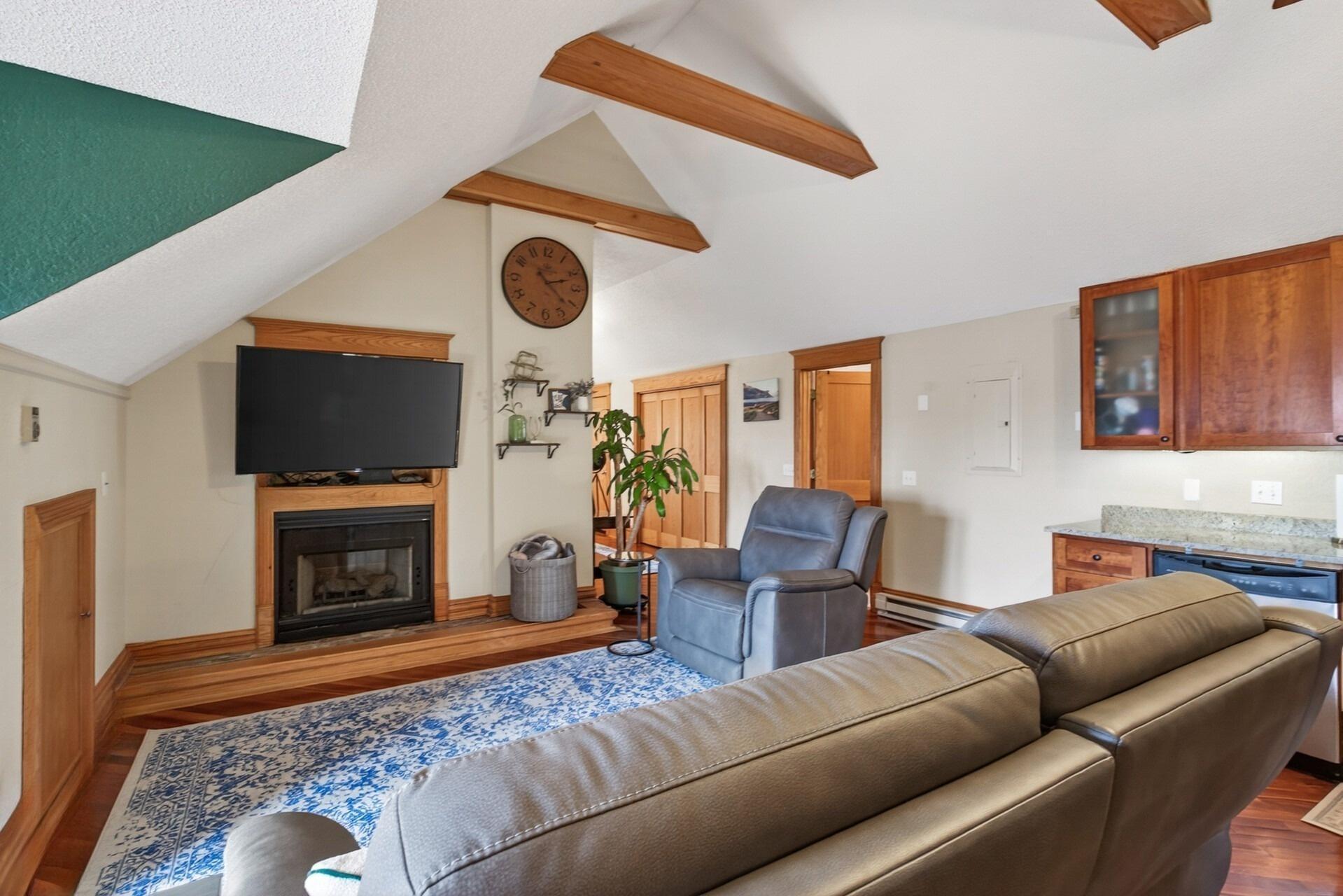 This beautiful, corner unit condo is filled with natural light from three walls of windows!