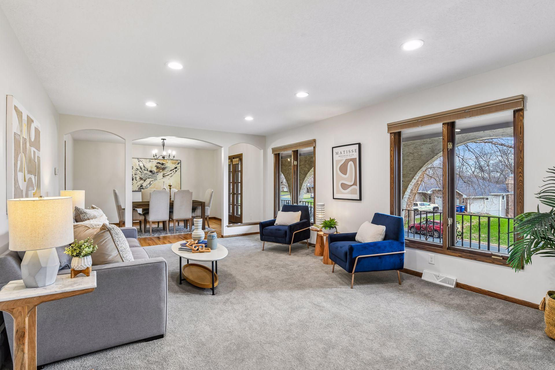 19x13 Upper-level living room with Fresh paint and east-facing windows.