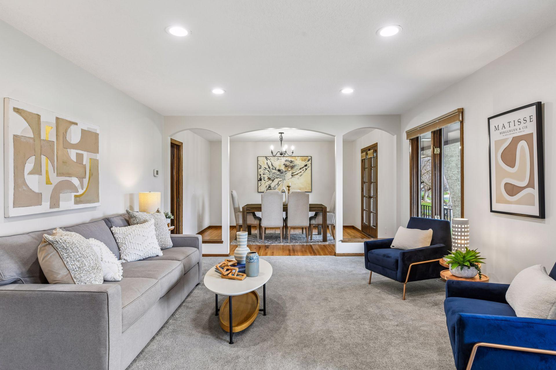 19x13 Upper-level living room with Fresh paint and east-facing windows.