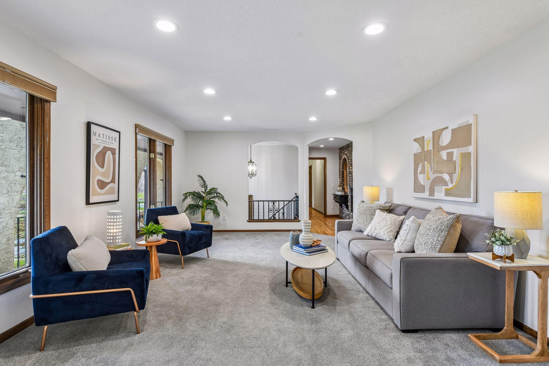 19x13 Upper-level living room with Fresh paint and east-facing windows.