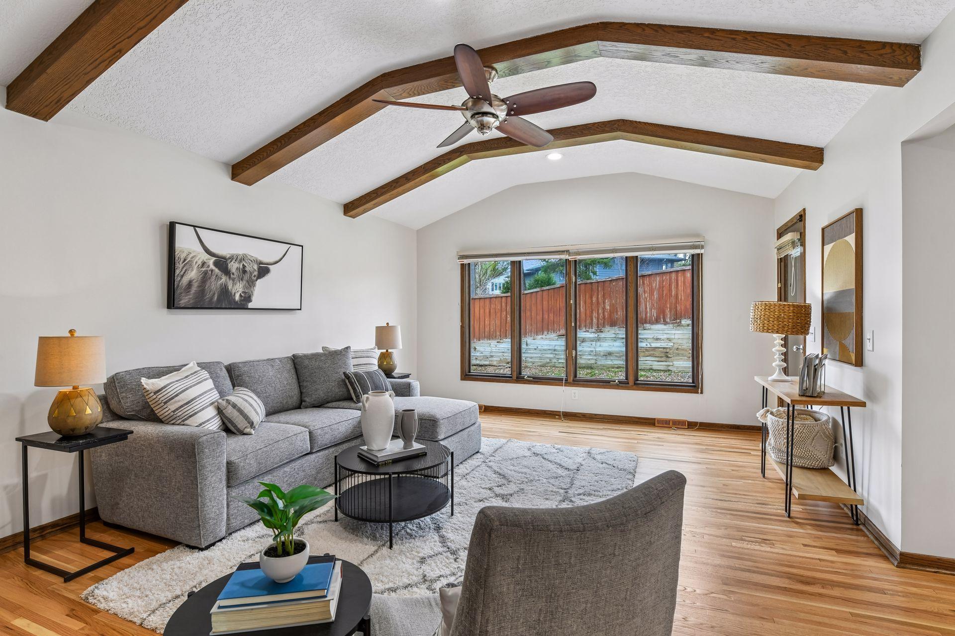 20x14 Upper Level Family room with freshly refinished oak hardwood floors and fresh paint. West-facing windows