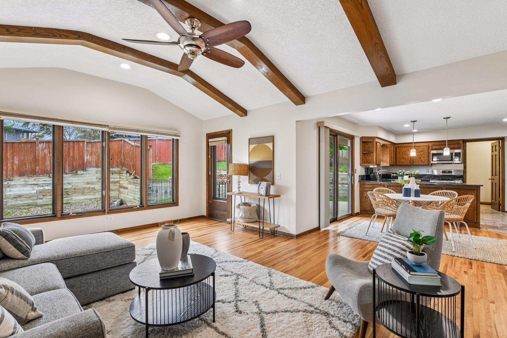 20x14 Upper Level Family room with freshly refinished oak hardwood floors and fresh paint. West-facing windows