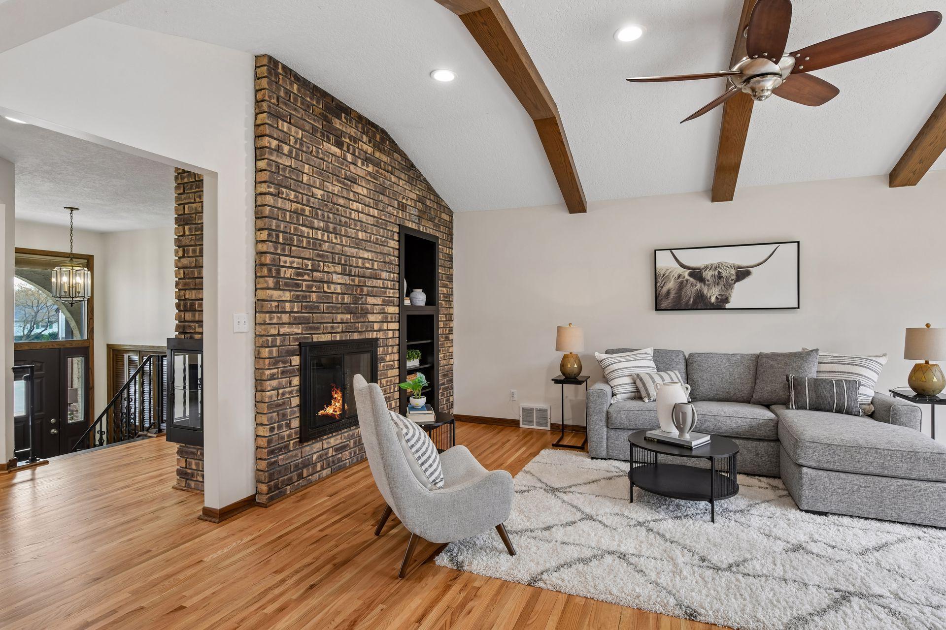 20x14 Upper Level Family room with freshly refinished oak hardwood floors and fresh paint. West-facing windows