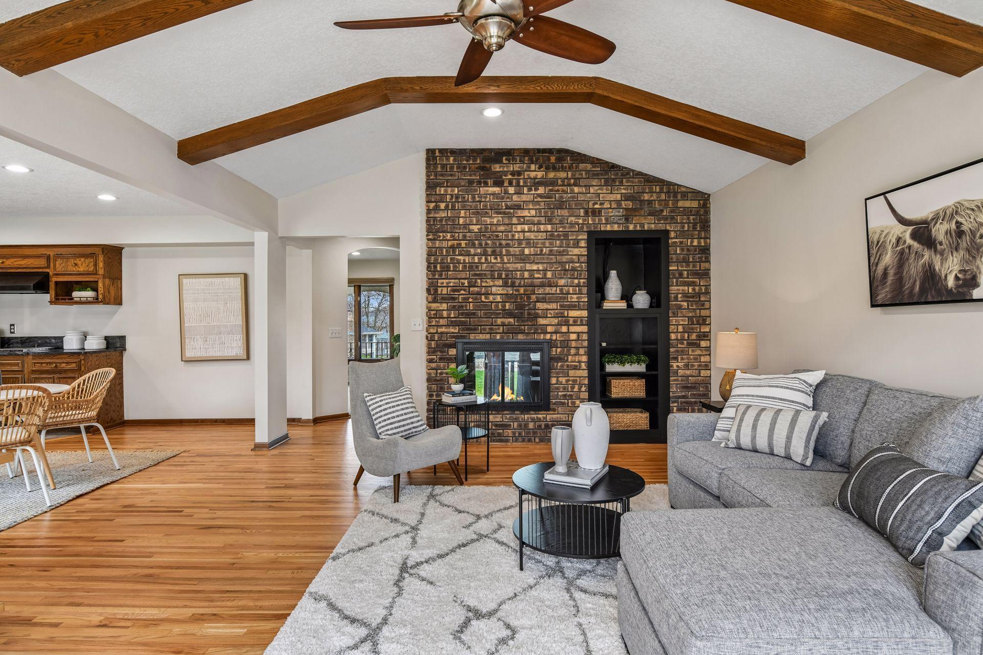 20x14 Upper Level Family room with freshly refinished oak hardwood floors and fresh paint. West-facing windows