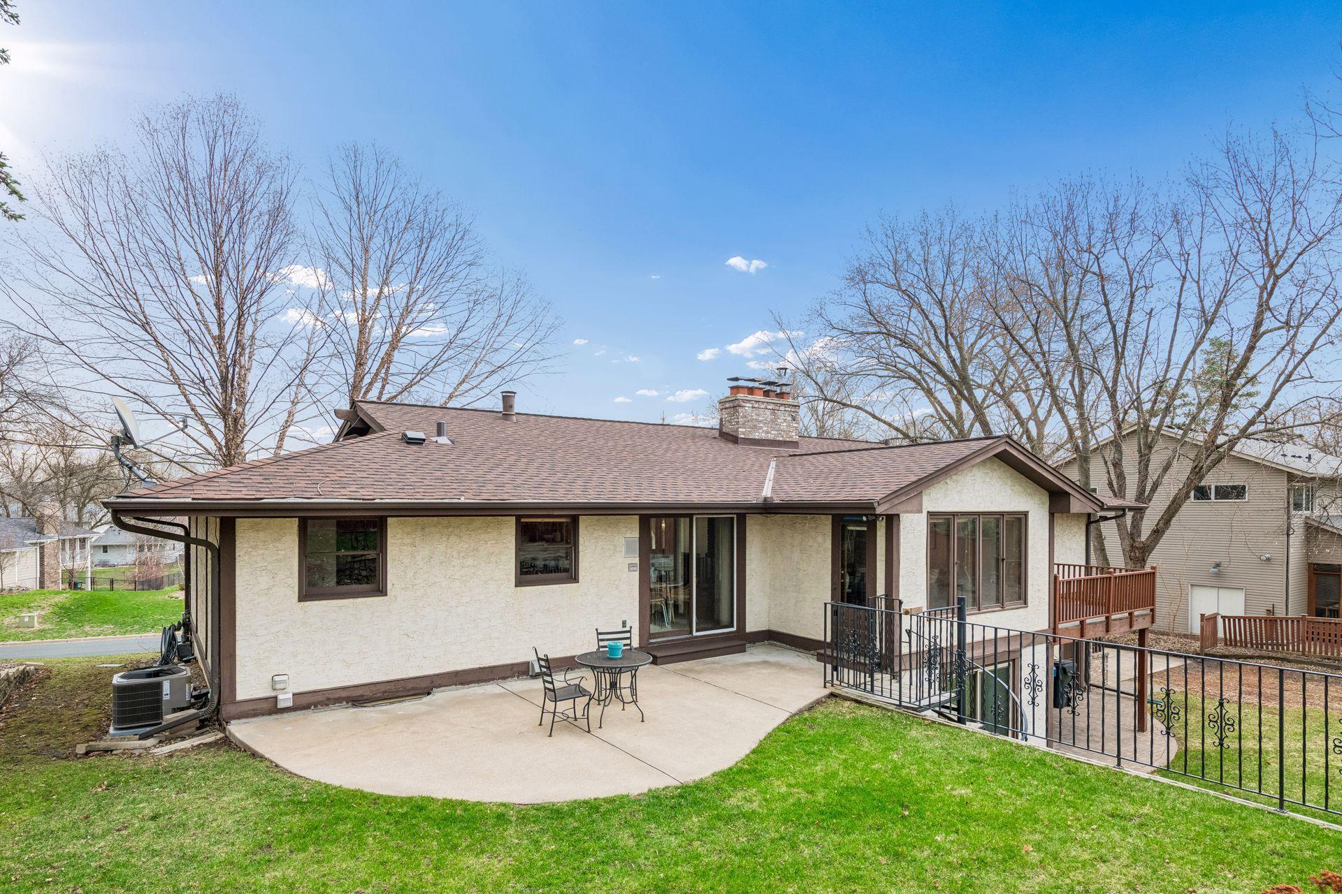 Backyard with a concrete patio.