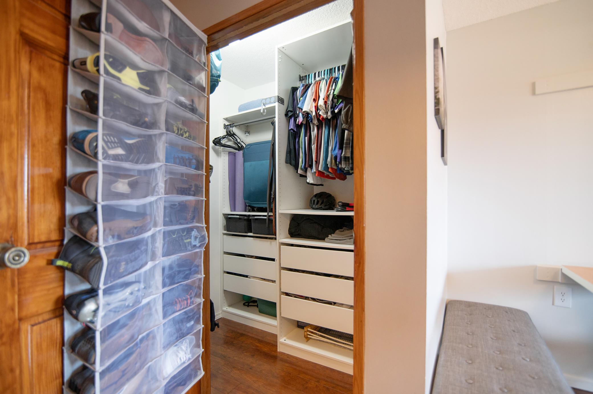 A spacious closet (6'x4') is smartly outfitted with built-in organizers to make the most of this space.