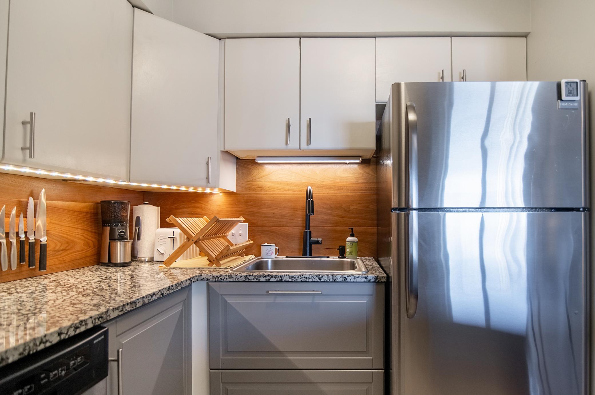 Whether you use it for a quick breakfast or more complex meals, this kitchen is a focal point of this charming unit.
