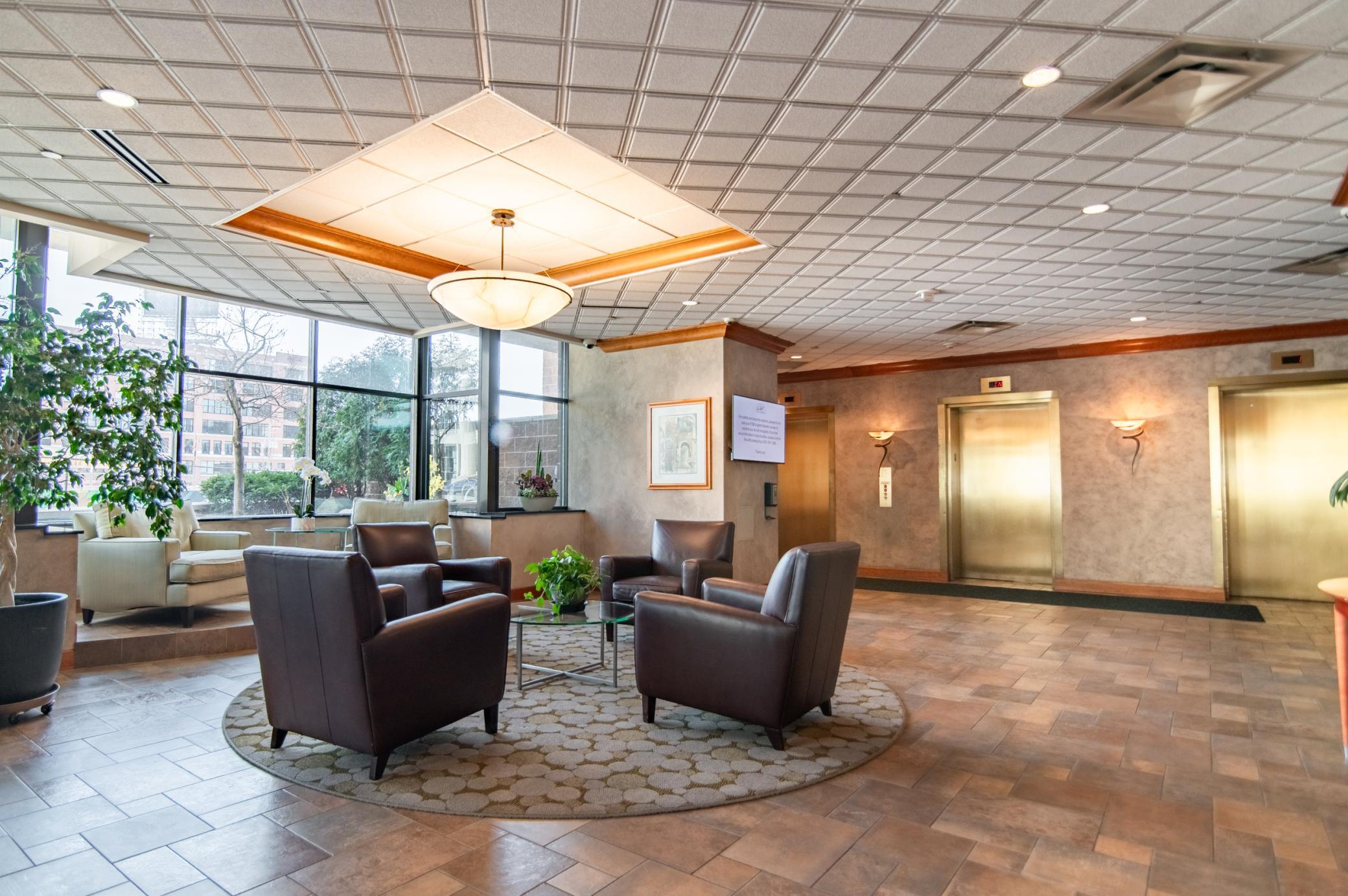 The lobby and elevators comfortably manage the flow of traffic in and out of the building with ease.