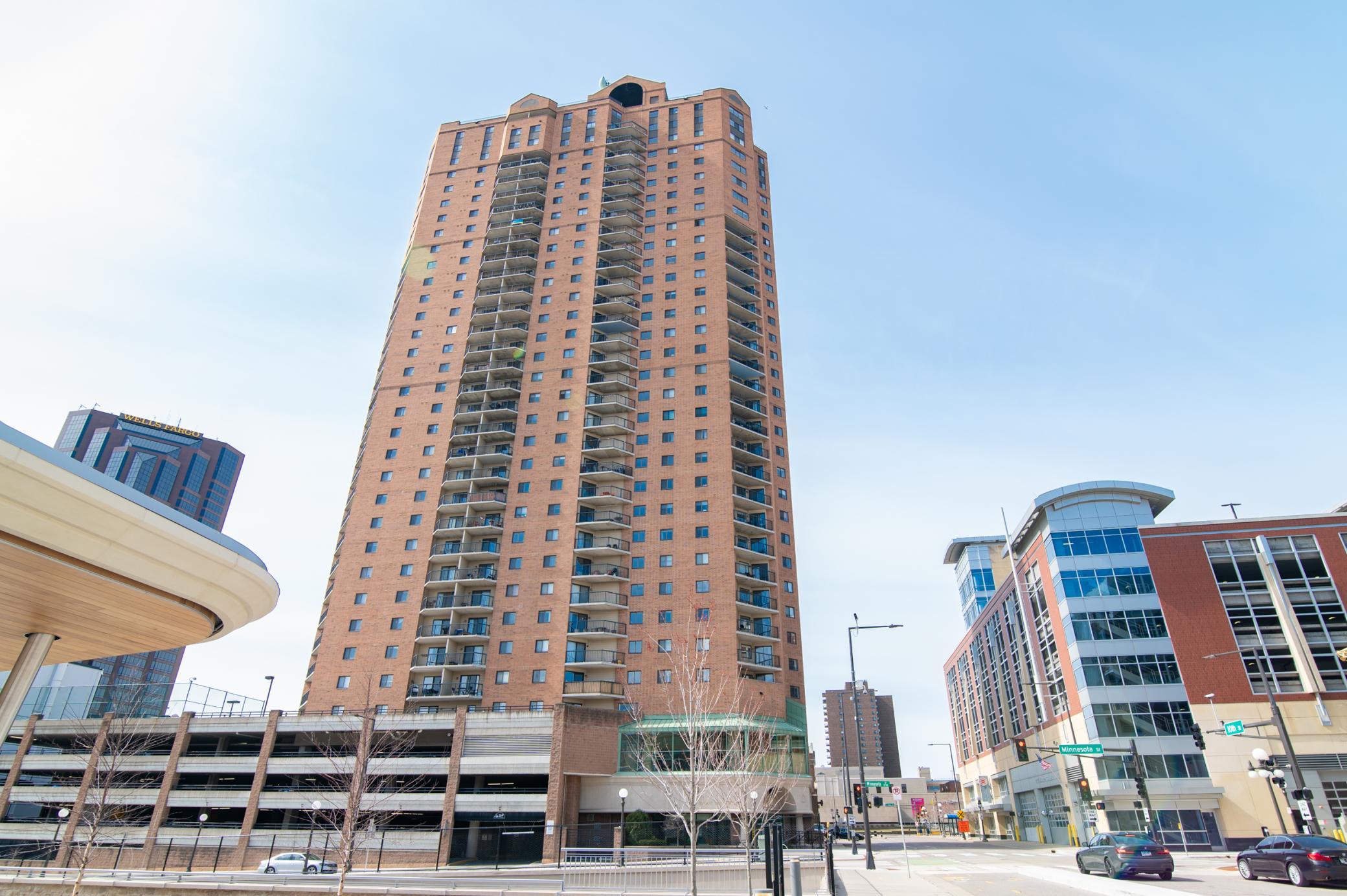 The Pointe condos as seen from Pedro Park - note in the center of the building you can see the balcony with the bamboo surround just above the patio and parking garage.
