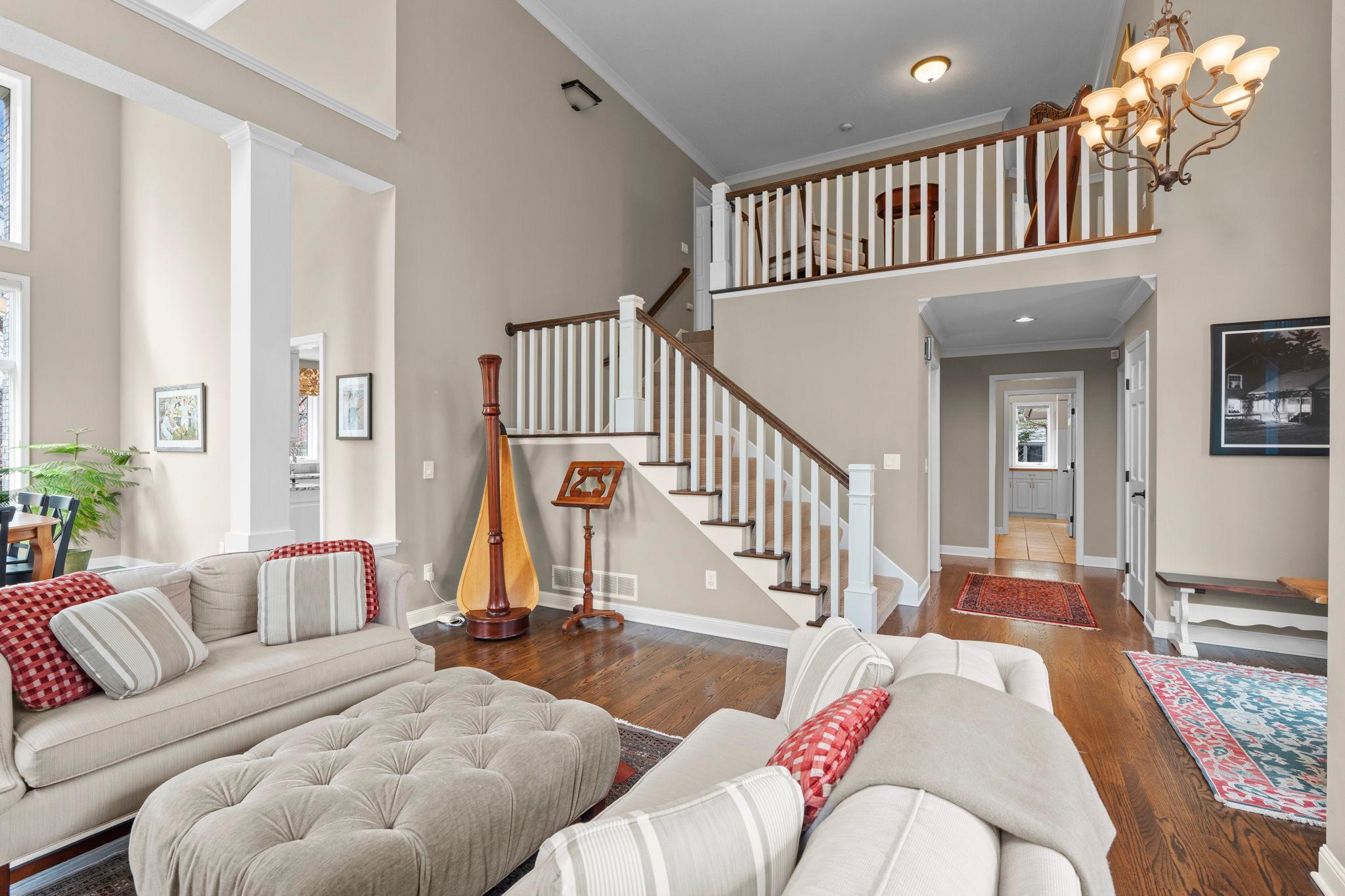 The detail in this home is amazing with a grand staircase and crown molding
