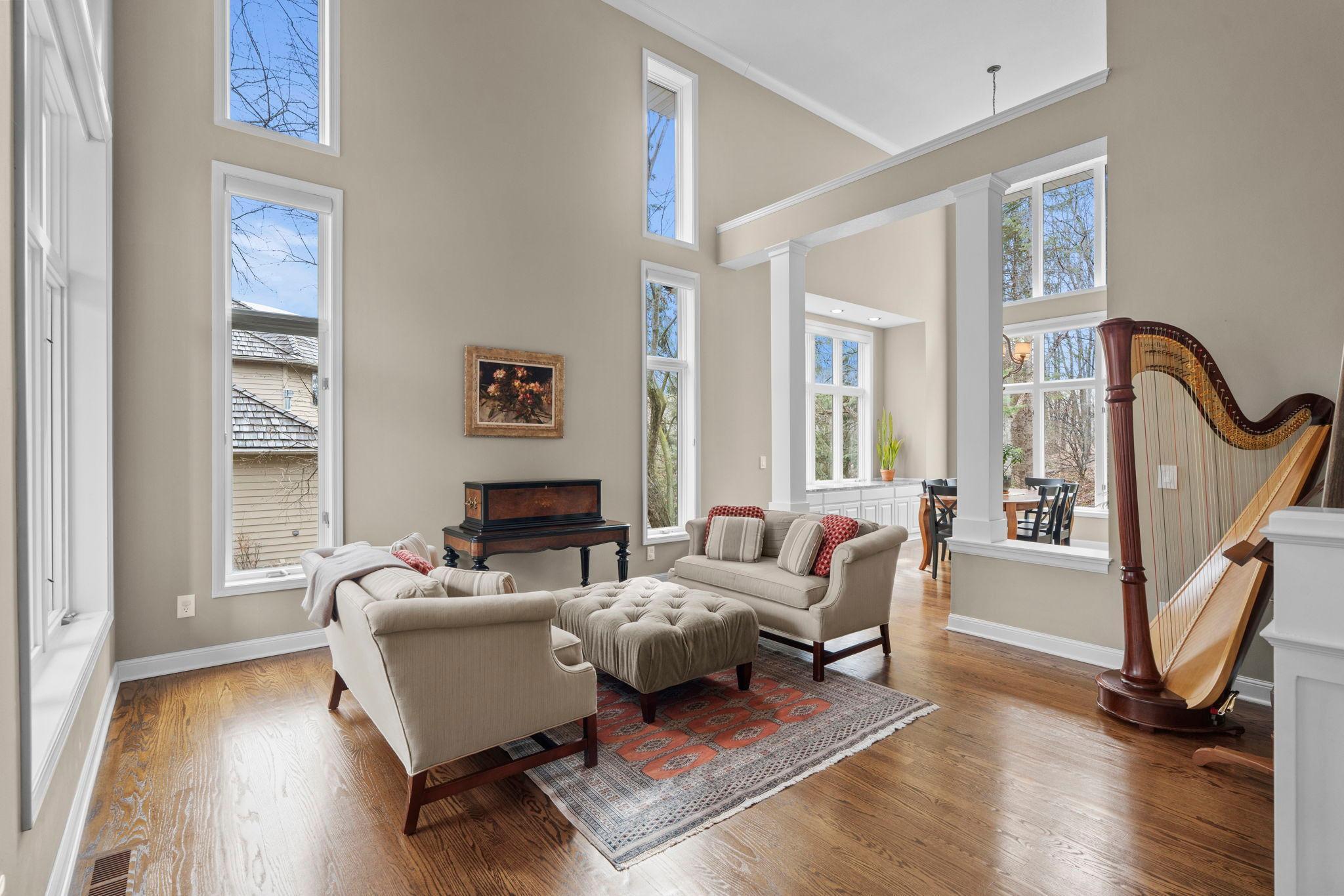 Formal front living room with an abundance of natural light