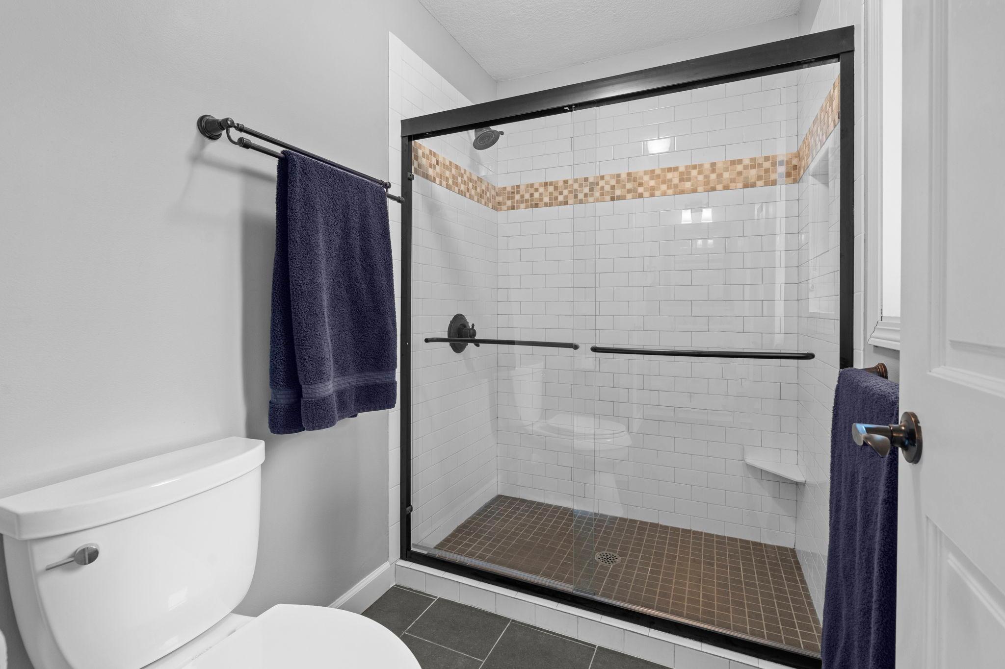 Separate shower room in the primary