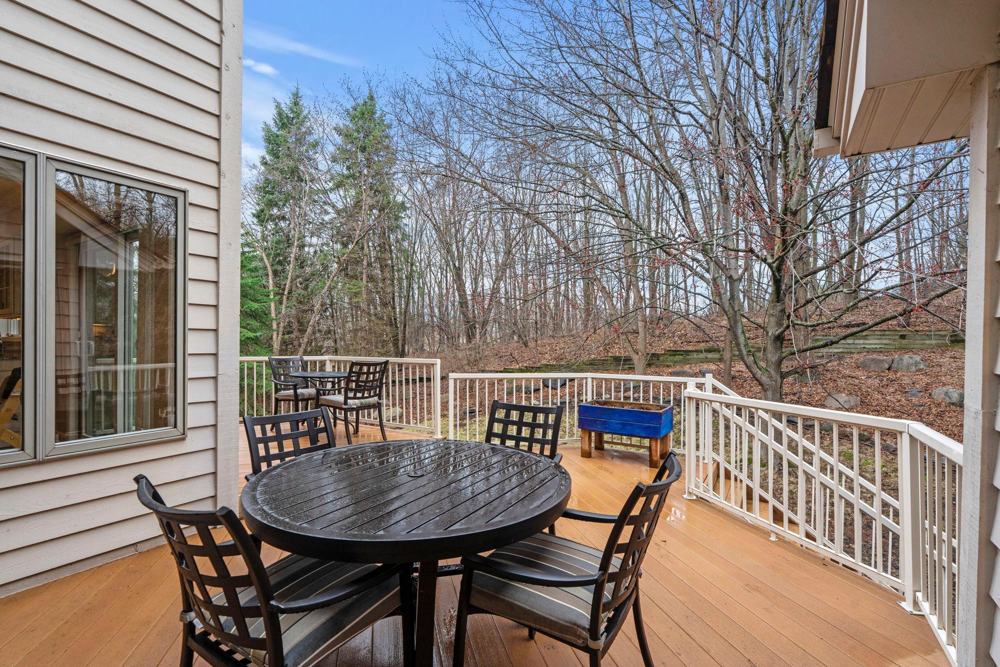Large deck overlooking the backyard