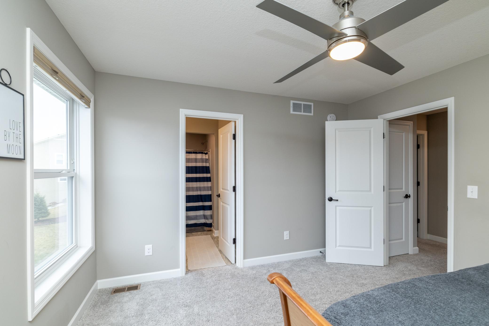 Secondary bedroom with convenient layout and ample closet space