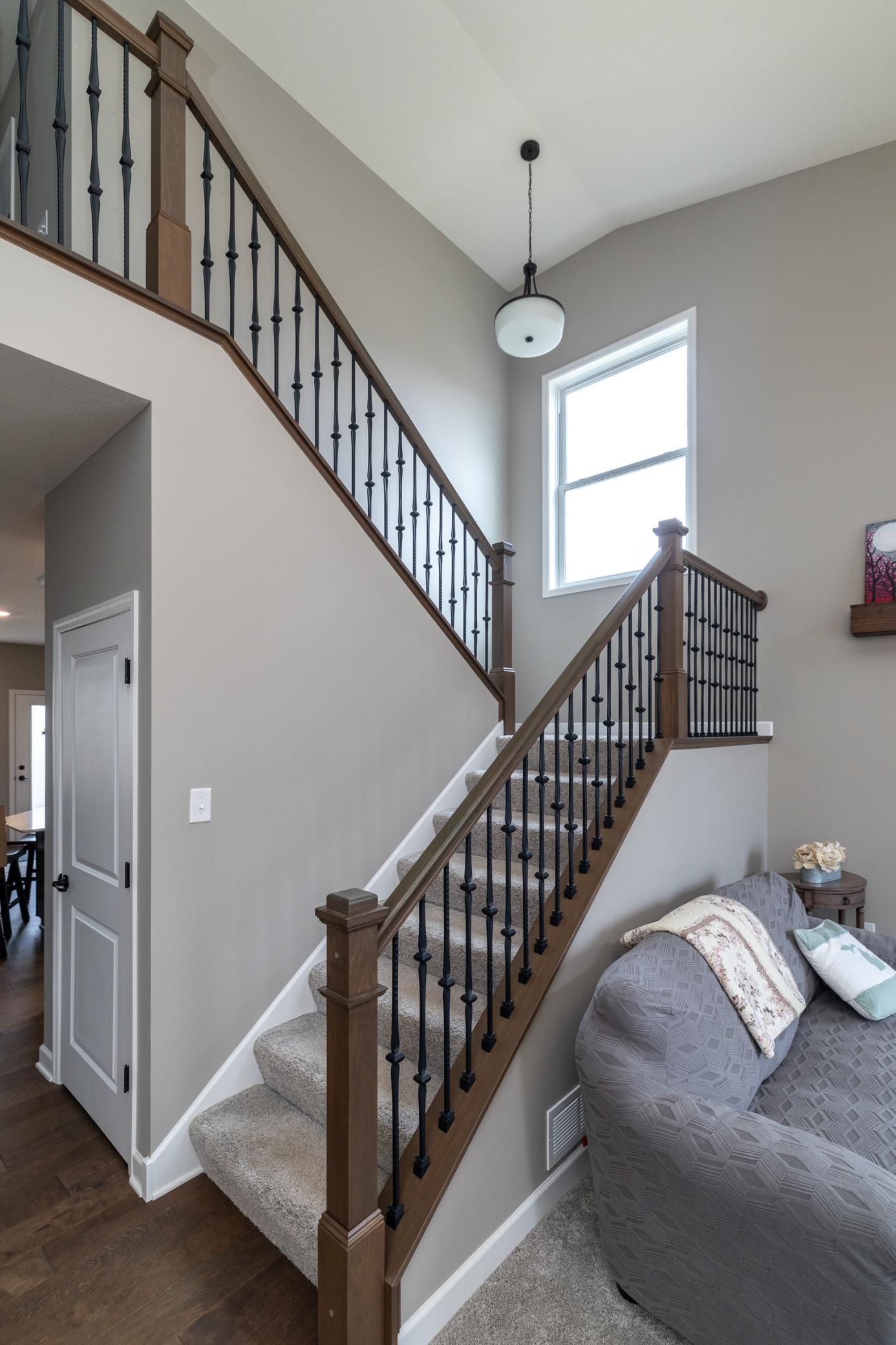 Beautiful staircase detail showcasing the open-concept design