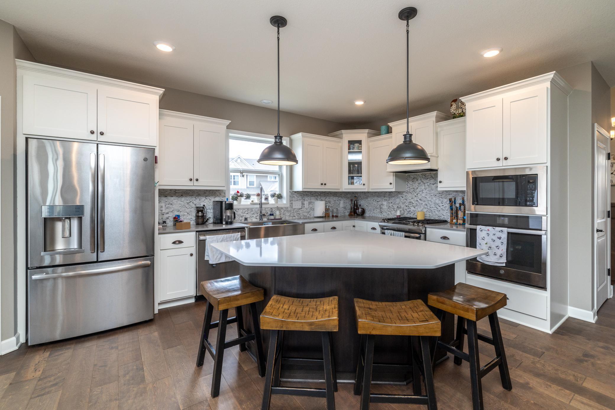 Spacious kitchen with abundant cabinetry and expansive prep space