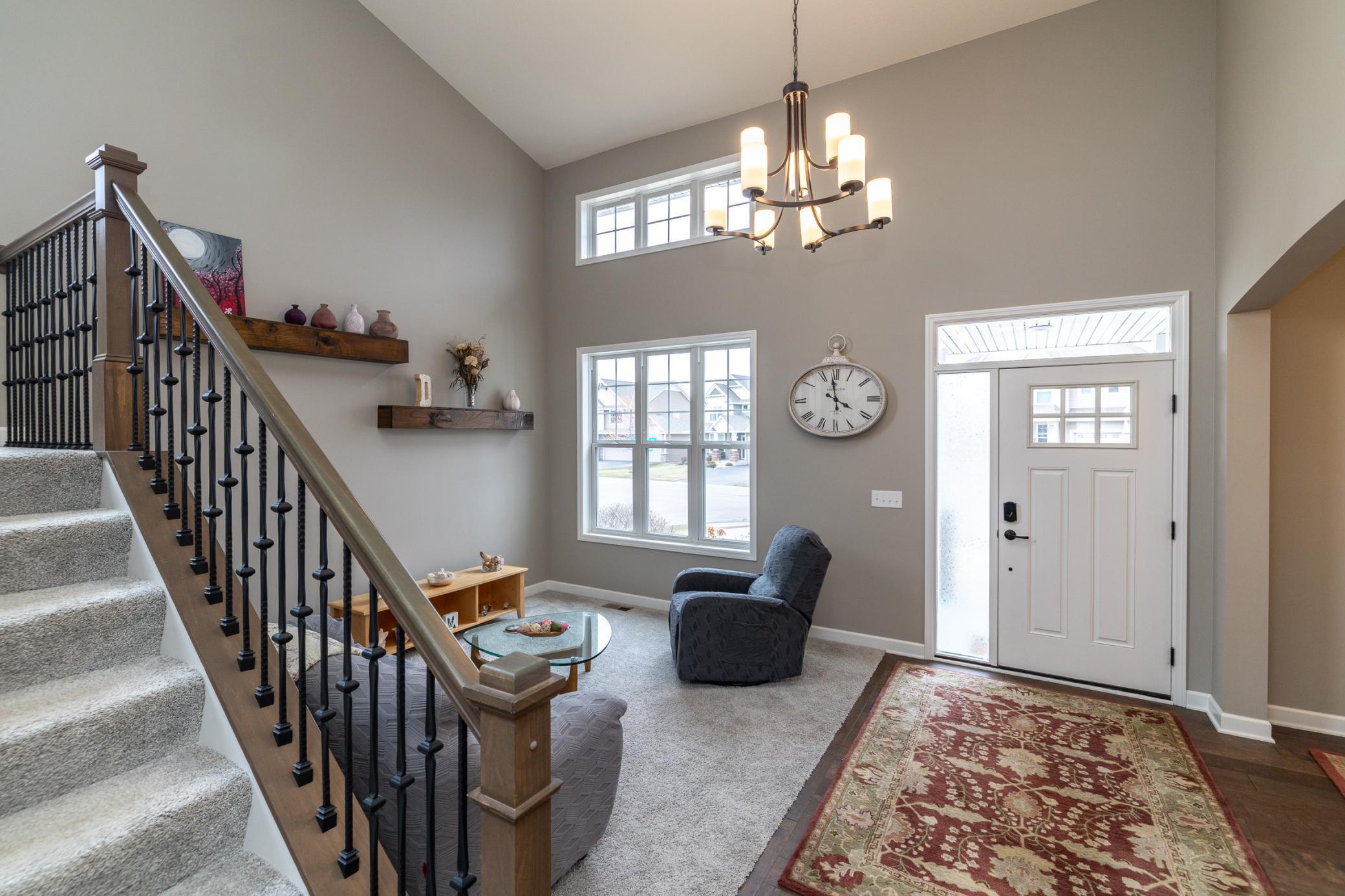 Open foyer and living space filled with natural light