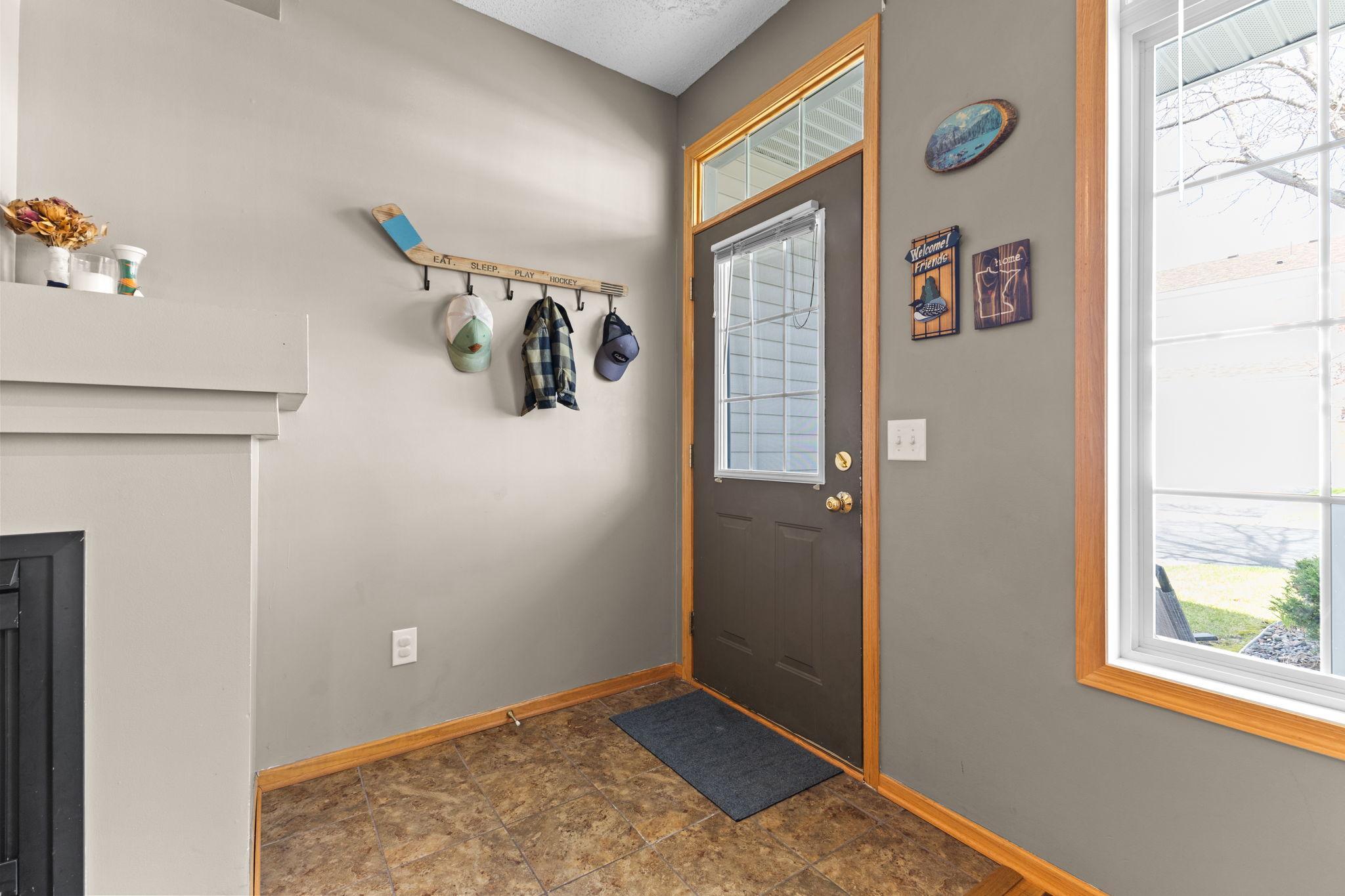 Welcoming entry with convenient coat space