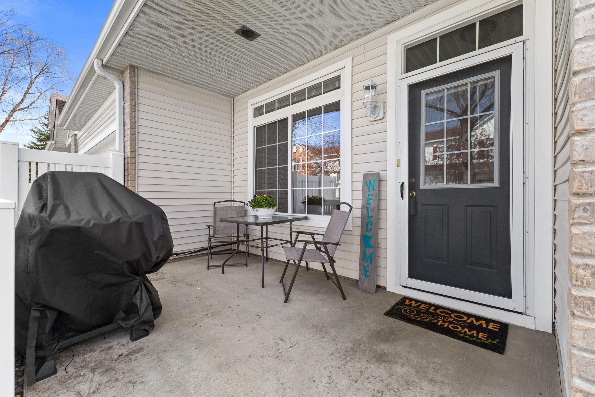 Cozy front patio, perfect for morning coffee or grilling dinner