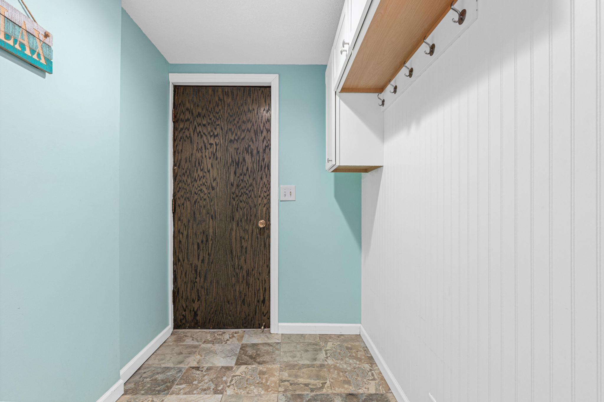 The mudroom off of the garage in the lower level.