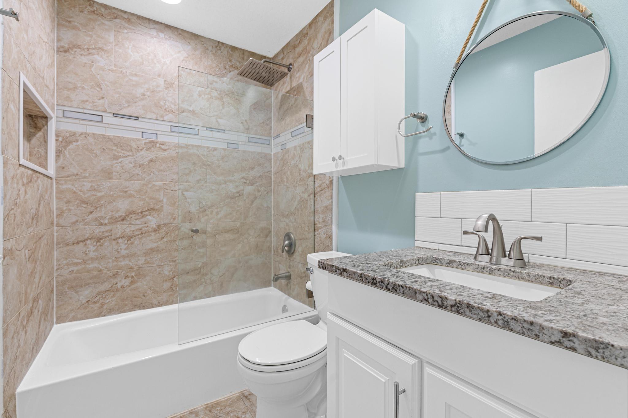 Gorgeous updated upper level bathroom.