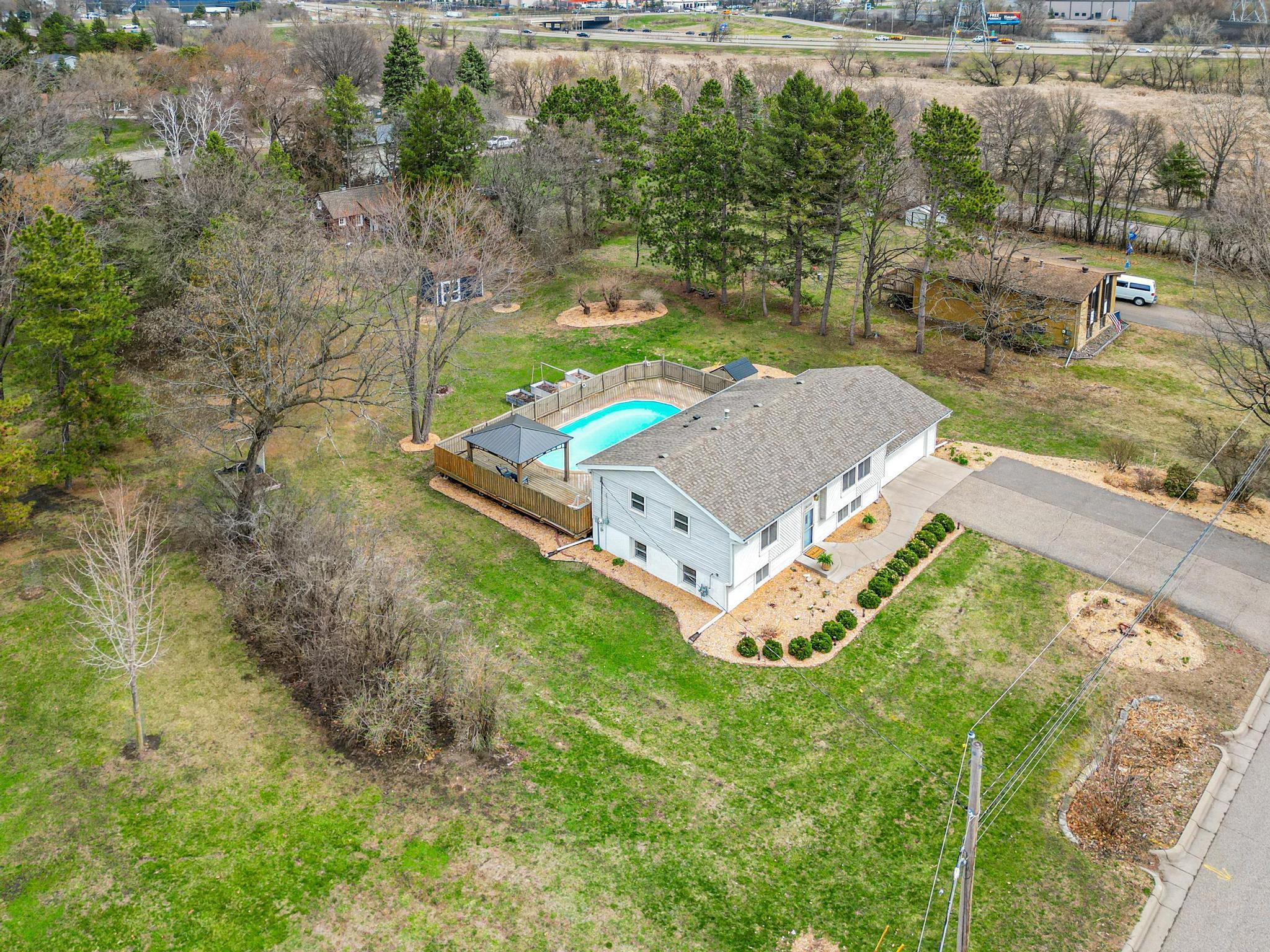 Set on over 1/2 acre, hard to find in Plymouth, Wayzata schools.