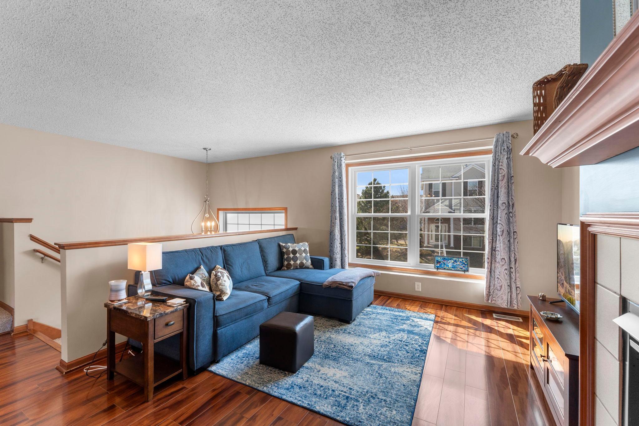 Great open living room area with large windows for letting in all the natural daylight