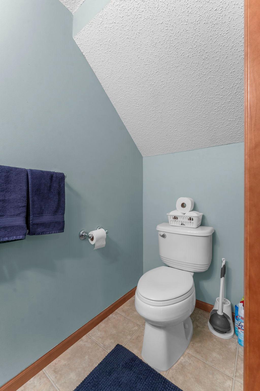 Main level half bath located just off the kitchen