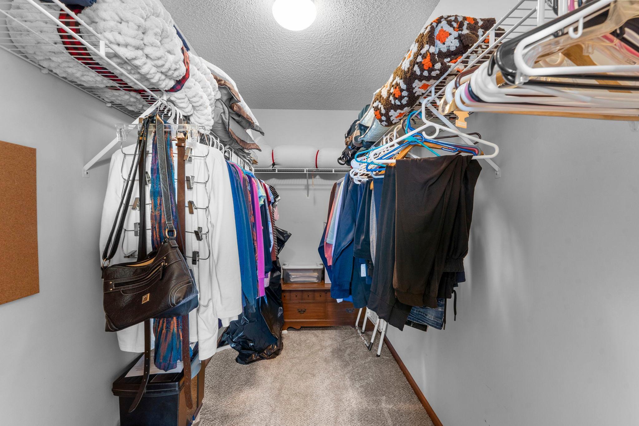 The primary suite also has a large walk in closet
