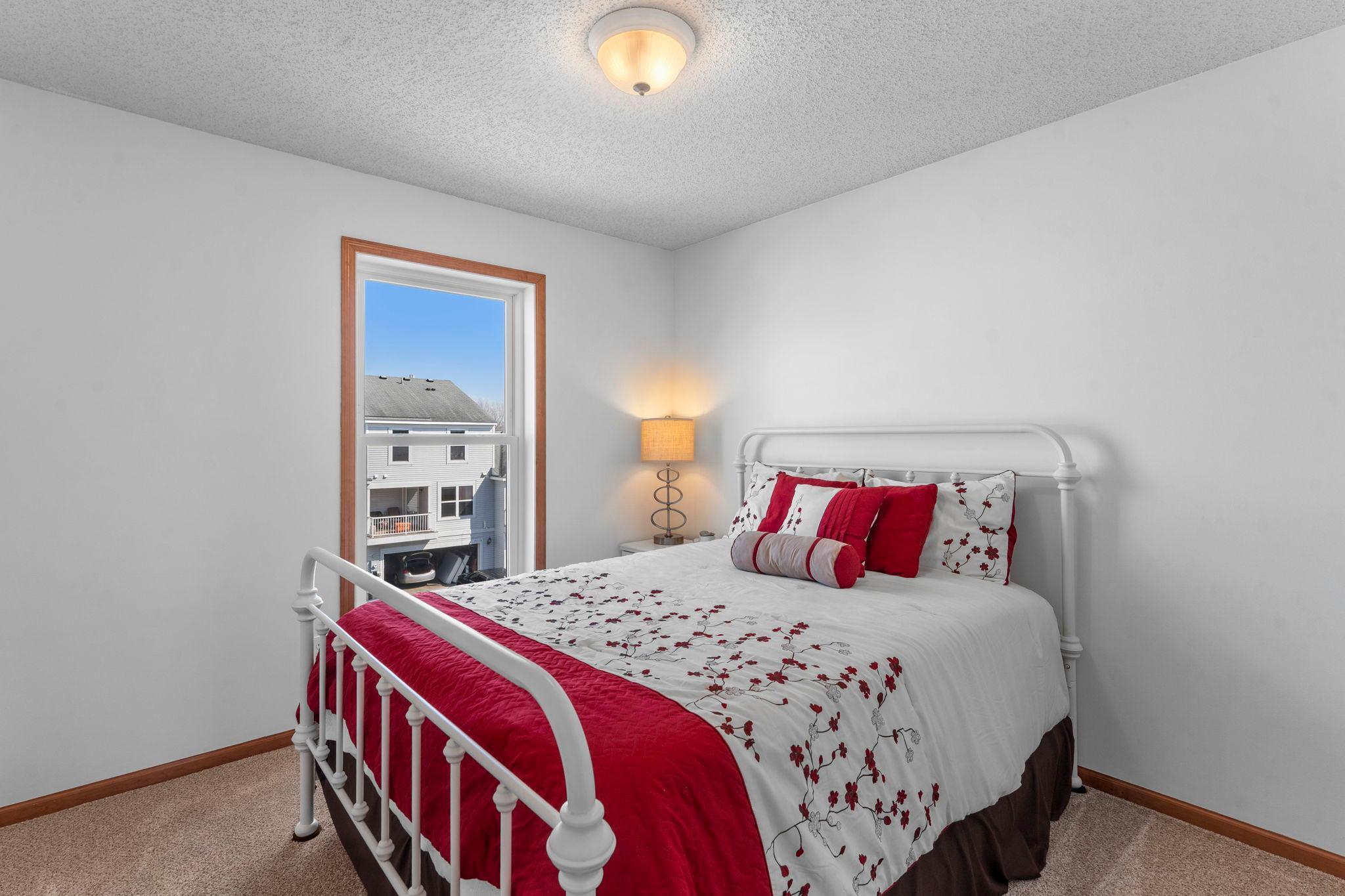 Bedroom 2 is spacious and bright - recently painted!