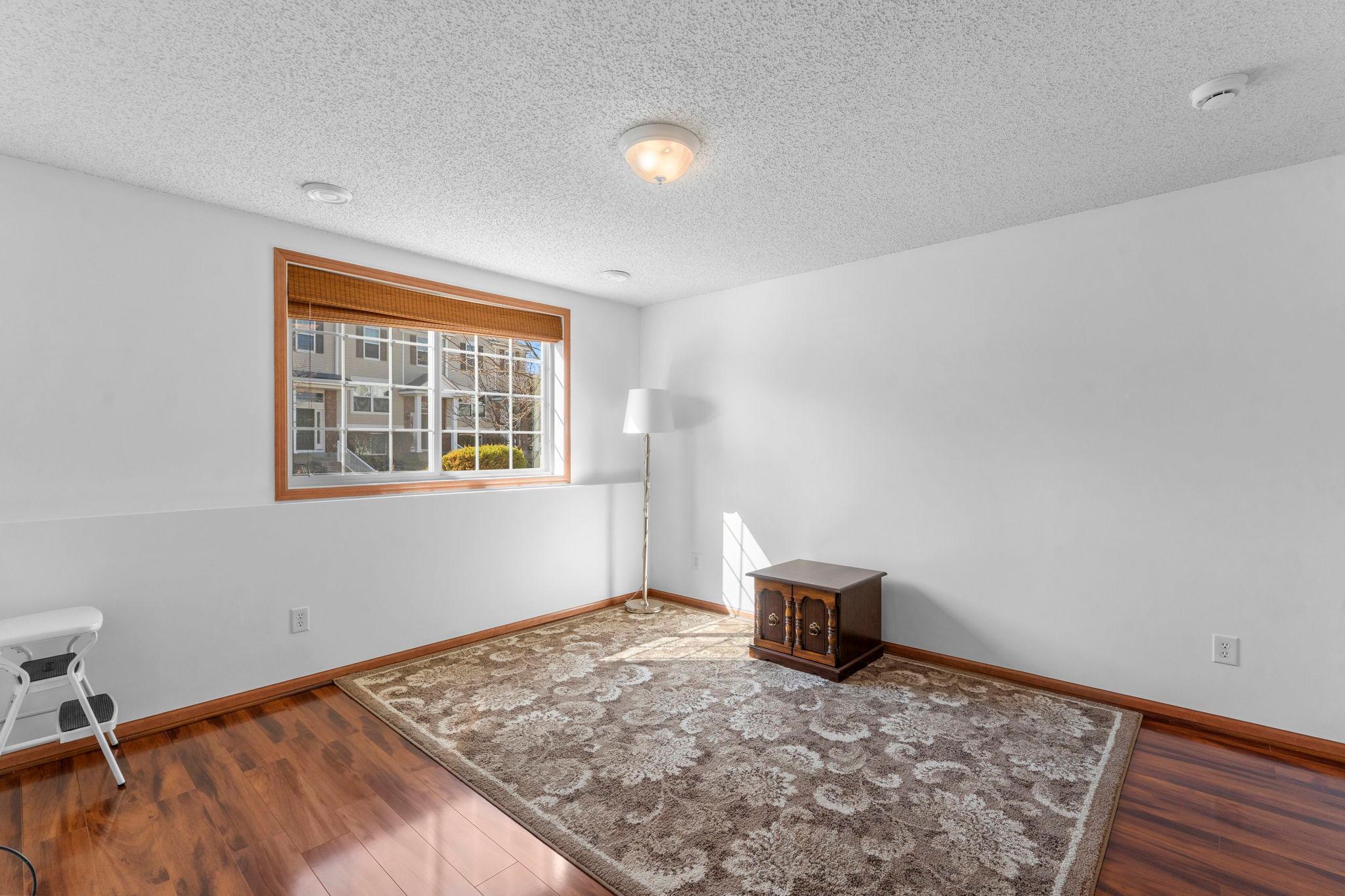 Lower level, just inside the garage, has great windows for adding natural light