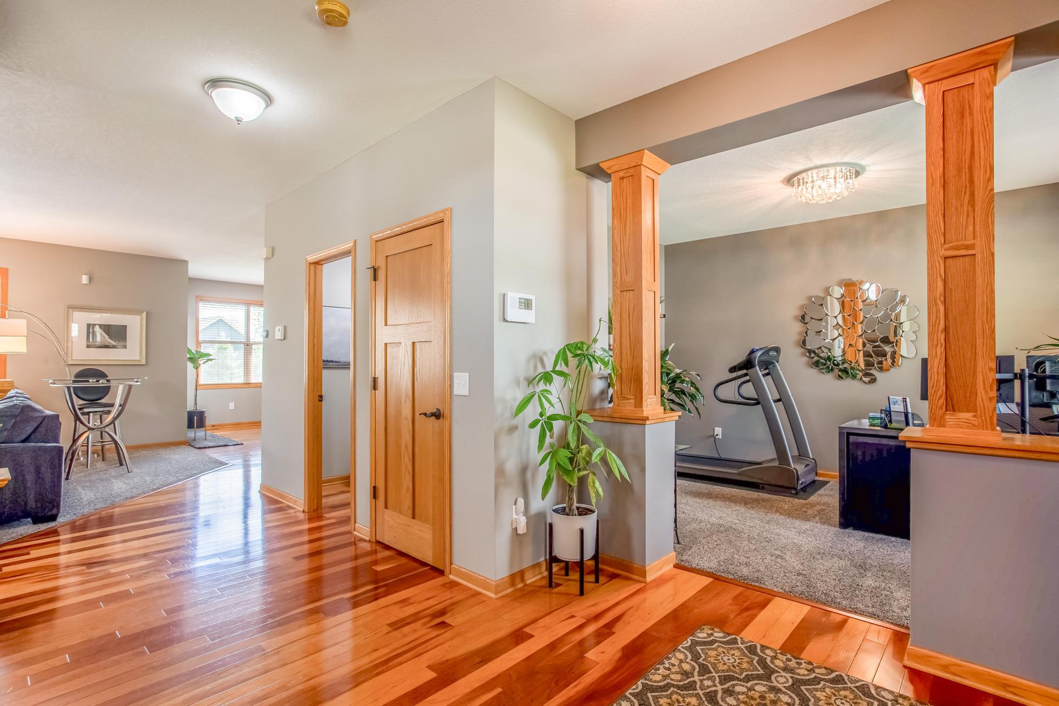 Welcoming main-level layout with rich hardwood floors and thoughtfully designed open-concept living spaces.