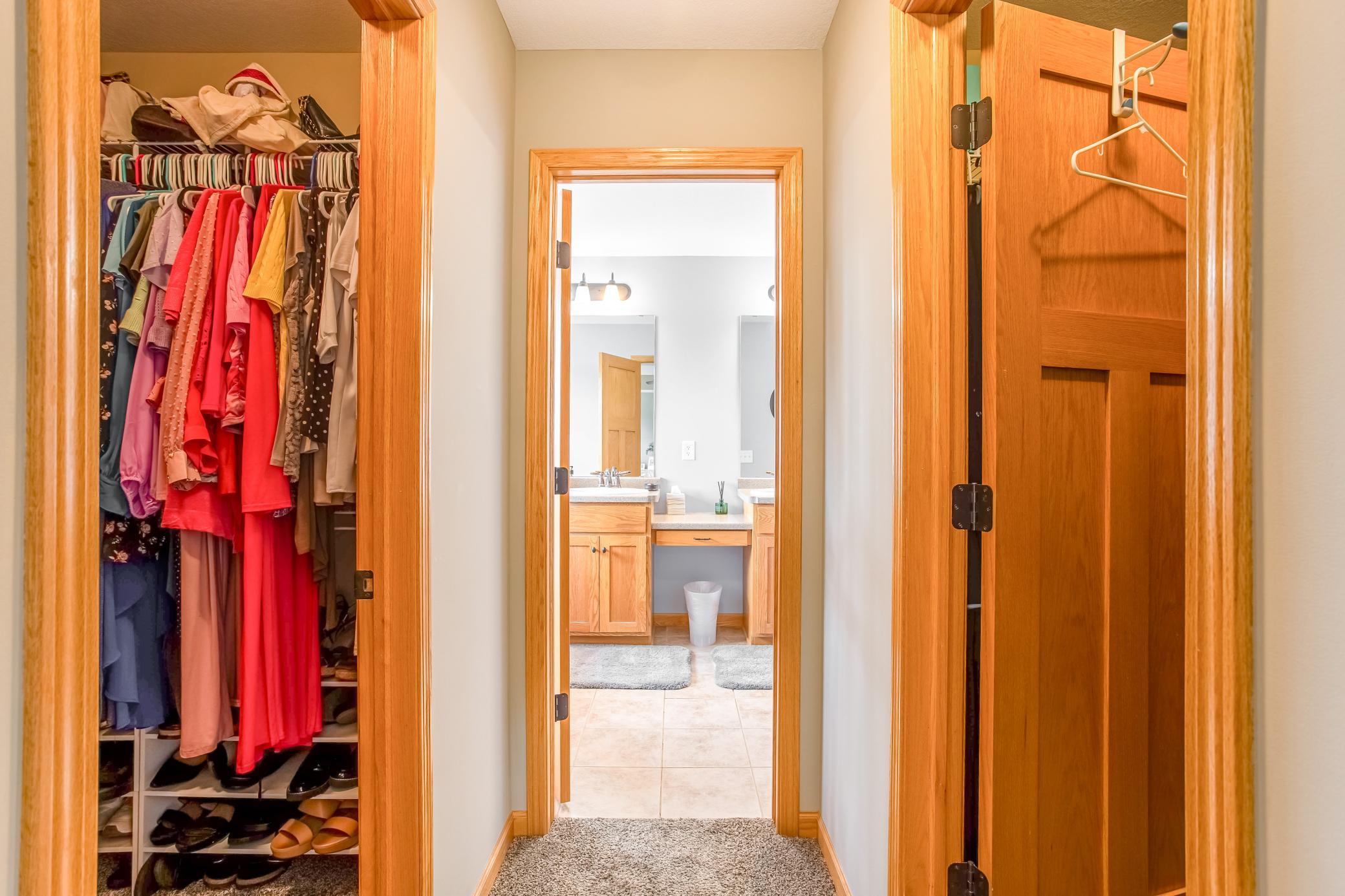 Dual his/her closets with ample storage and direct access to the spacious en suite bathroom.