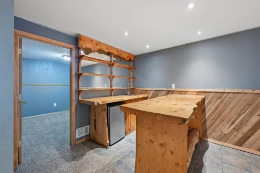 Wet bar area great for entertaining or quick snacks!