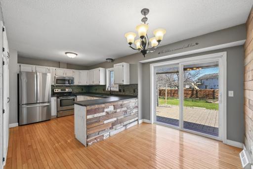 Dining room with wood accent peninsula